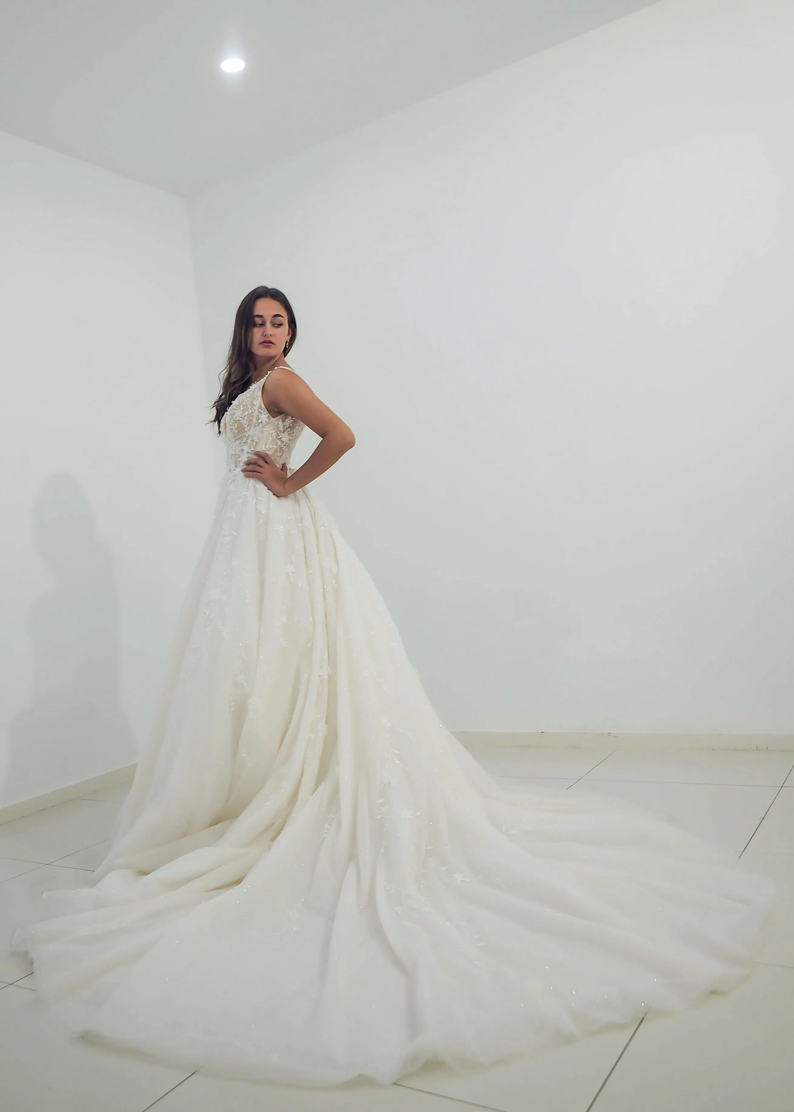 Sparkling white V neck wedding dress with open back for hire